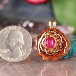 TEP Pendants Ruby With Gold Seed Of Life