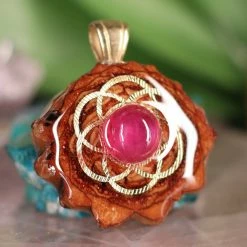 TEP Pendants Ruby With Gold Seed Of Life