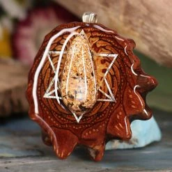 TEP Orgonite With Moonstone With Silver Merkaba And Back Om Pendants
