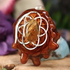 TEP Glowing Rutilated Quartz With Silver Seed Of Life Pendants