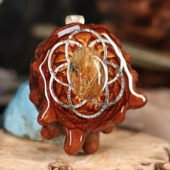 TEP Glowing Rutilated Quartz With Silver Seed Of Life Pendants