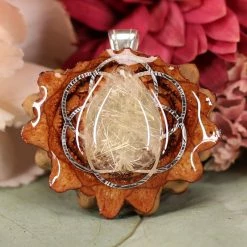 TEP Pendants Glowing Rutilated Quartz With Silver Seed Of Life
