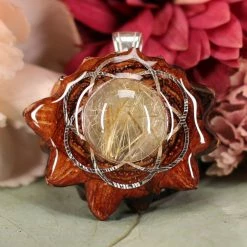 TEP Pendants Glowing Rutilated Quartz With Silver Seed Of Life
