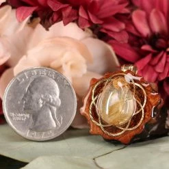 TEP Pendants Glowing Rutilated Quartz With Gold Seed Of Life