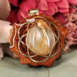 TEP Pendants Glowing Rutilated Quartz With Gold Seed Of Life