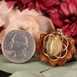 TEP Pendants Glowing Rutilated Quartz With Gold Seed Of Life