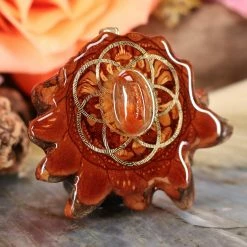 TEP Red Sunstone With Gold Seed Of Life