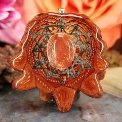 TEP Red Sunstone With Gold 64 Star Tetrahedron