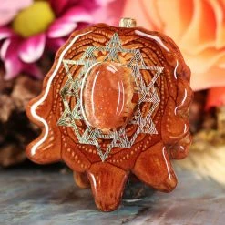 TEP Red Sunstone With Gold 64 Star Tetrahedron