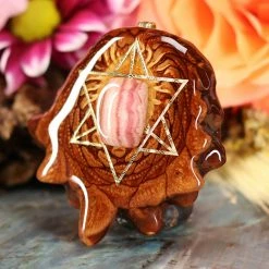 TEP Rhodochrosite With Gold Merkaba