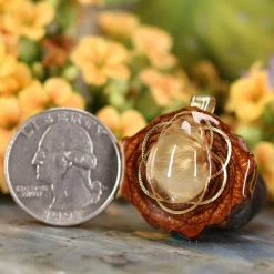 TEP Glowing Rutilated Quartz With Gold Seed Of Life