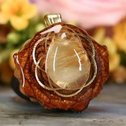 TEP Glowing Rutilated Quartz With Gold Seed Of Life