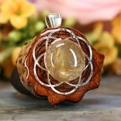 TEP Pendants Glowing Rutilated Quartz With Silver Seed Of Life