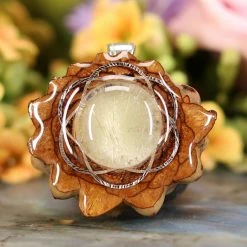 TEP Pendants Glowing Rutilated Quartz With Silver Seed Of Life