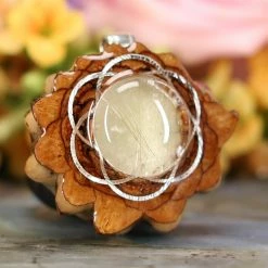 TEP Pendants Glowing Rutilated Quartz With Silver Seed Of Life 7 TEP Pendants Glowing Rutilated Quartz With Silver Seed Of Life