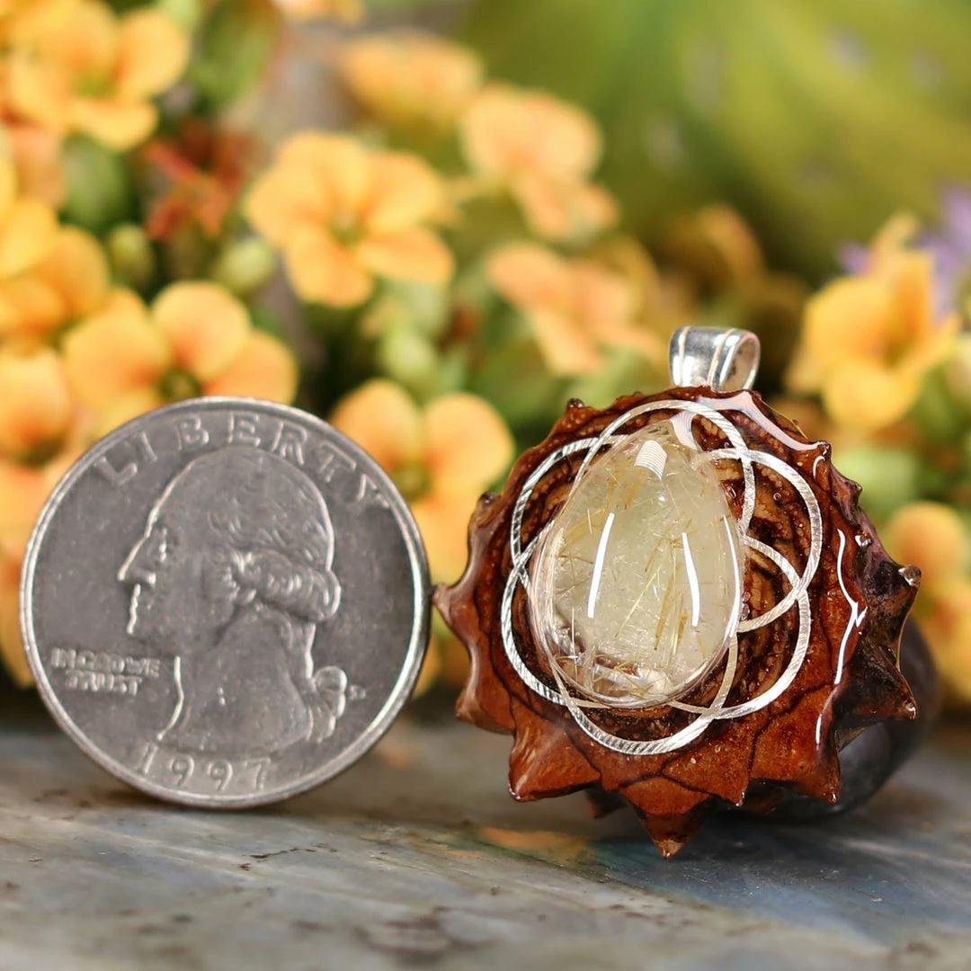 TEP Glowing Rutilated Quartz With Silver Seed Of Life Pendants 4 TEP Glowing Rutilated Quartz With Silver Seed Of Life Pendants