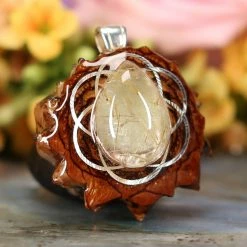 TEP Glowing Rutilated Quartz With Silver Seed Of Life Pendants 7 TEP Glowing Rutilated Quartz With Silver Seed Of Life Pendants