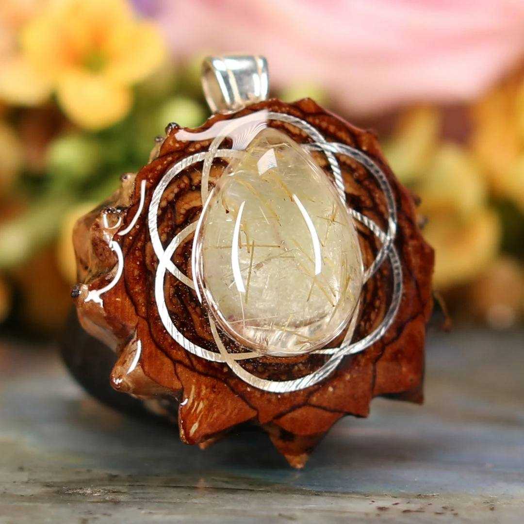 TEP Glowing Rutilated Quartz With Silver Seed Of Life Pendants 5 TEP Glowing Rutilated Quartz With Silver Seed Of Life Pendants