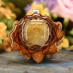 TEP Glowing Rutilated Quartz With Silver Seed Of Life Pendants