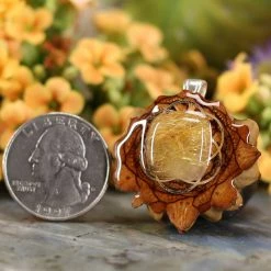 TEP Glowing Rutilated Quartz With Silver Seed Of Life Pendants