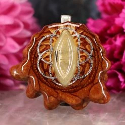 TEP Glowing Rutilated Quartz With Silver Seed Of Life Pendants