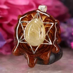TEP Glowing Rutilated Quartz With Silver Merkaba Pendants