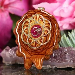 TEP Pendants Crushed Sugilite (Glows) With Gold Seed Of Life And Front Om